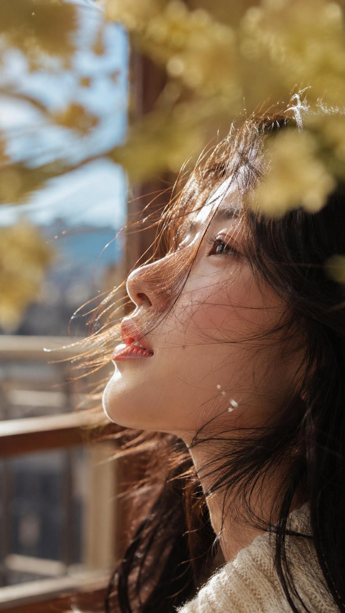 Sunlit Profile Portrait with Golden Leaves
