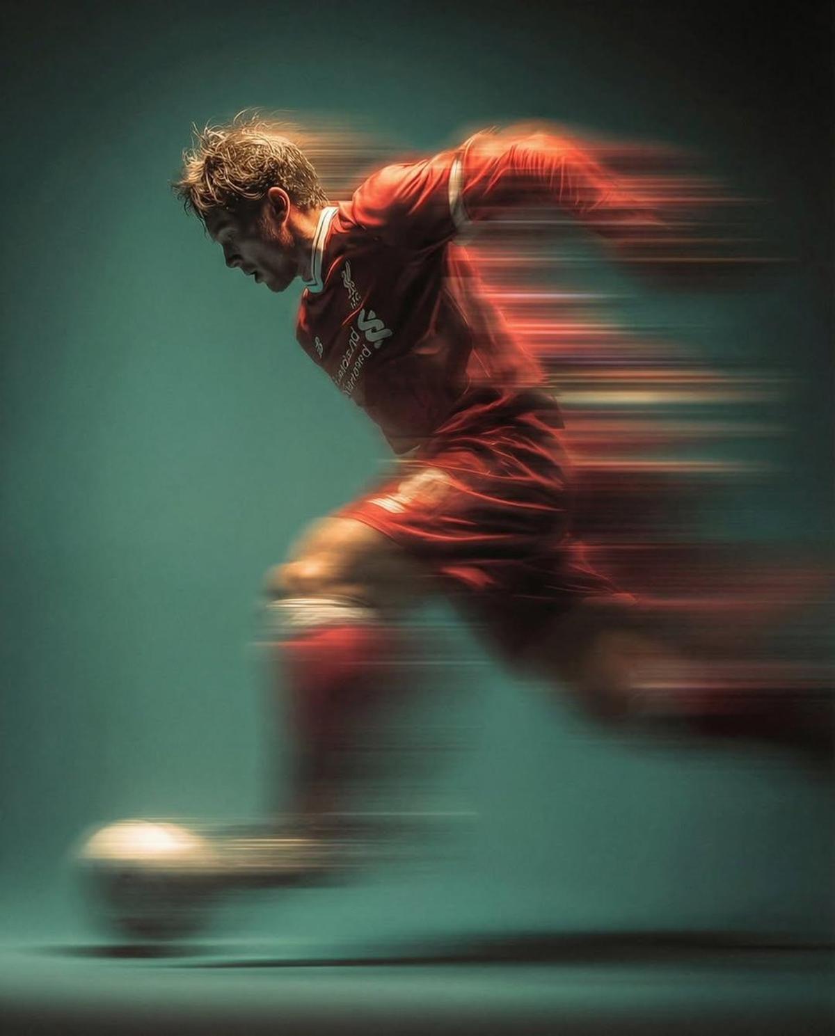 Panning shot of a mysterious soccer player in red proffesion